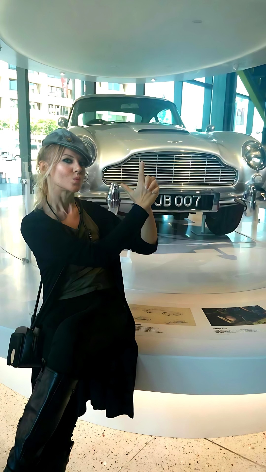 ROMI WITH THE ASTON MARTIN DB5 JAMES BOND CAR-SPY MUSEUM-WASHINGTON DC 2